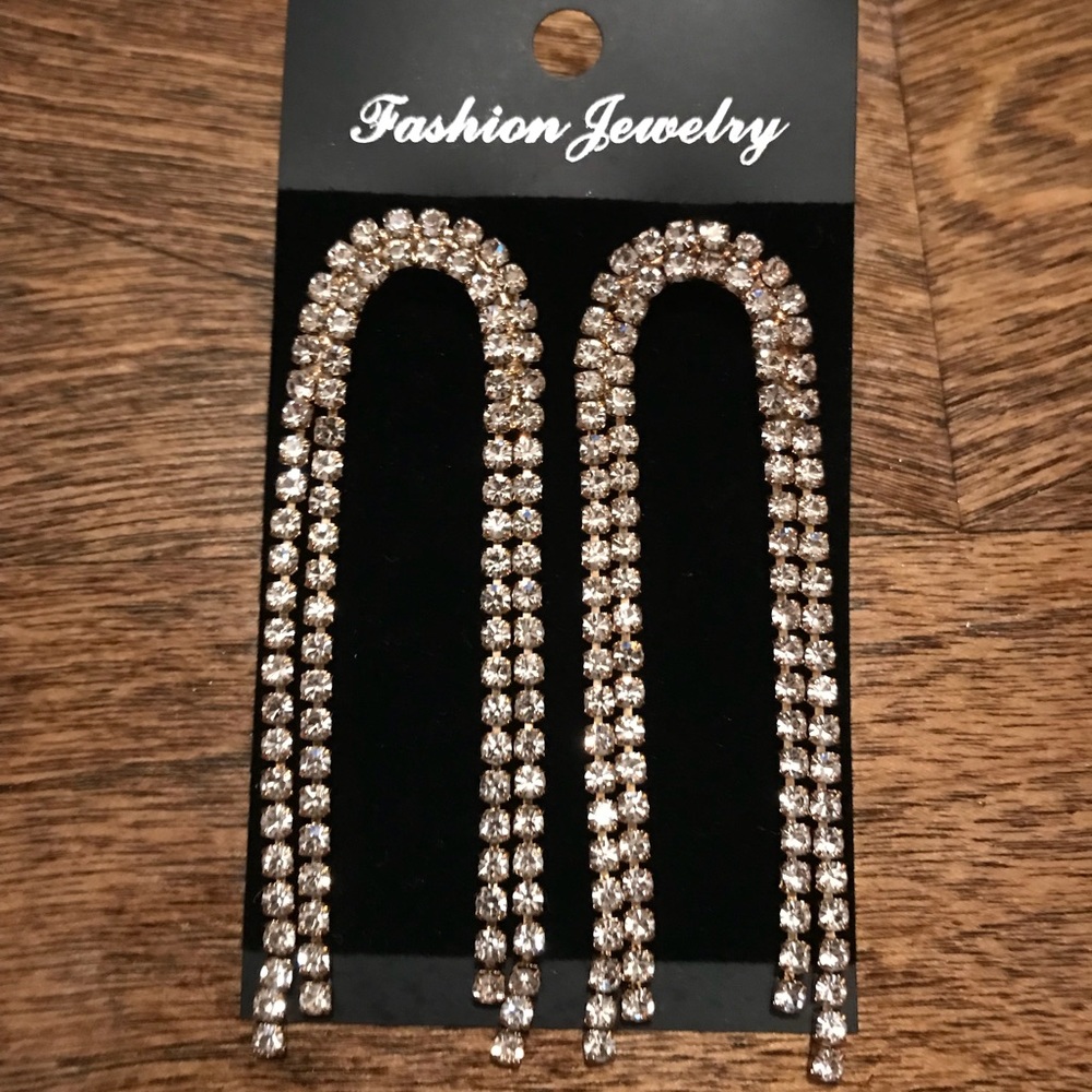 Dangle gold tone earrings